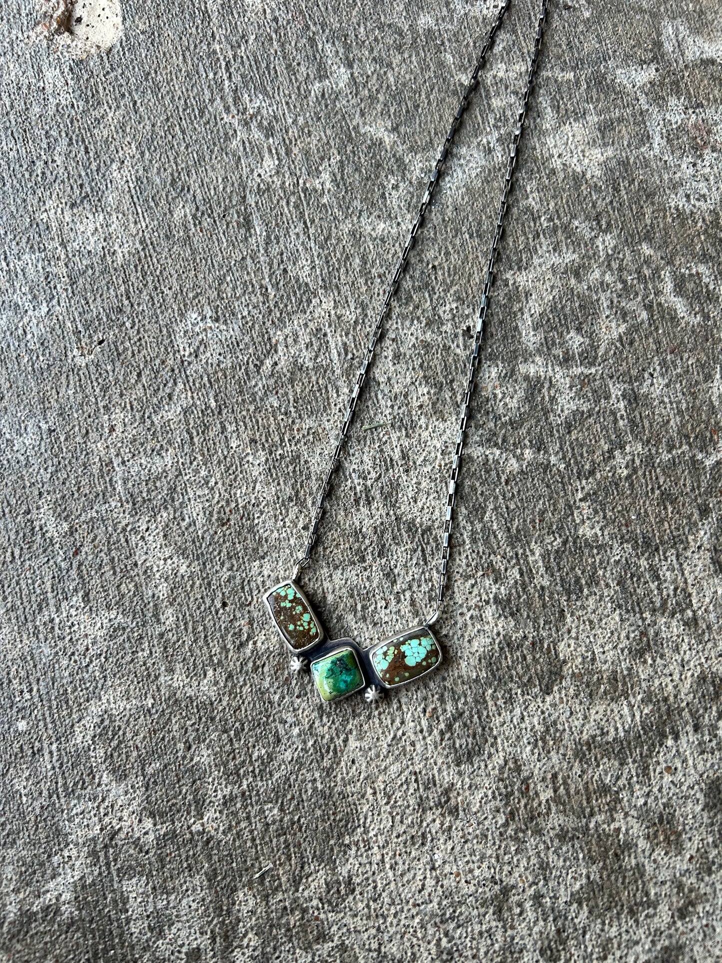 The “V” necklace